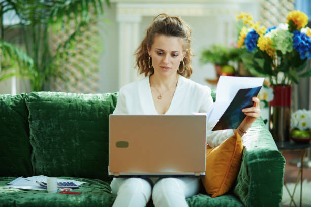 istock woman with documents and calculator claiming insurance case 1224202665