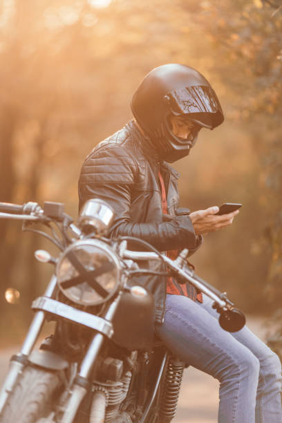 istock man preparing on a cafe racer motorcycle 1224204218