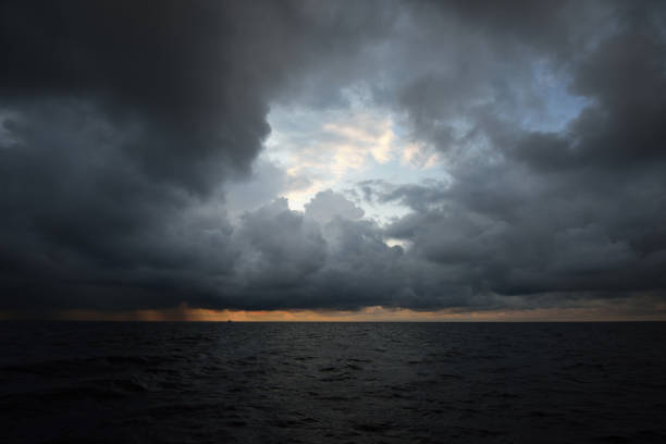 Terrific cloudscape. Sailing in a thunderstorm. Dramatic sky. Sunlight through the clouds. Baltic sea, Latvia
