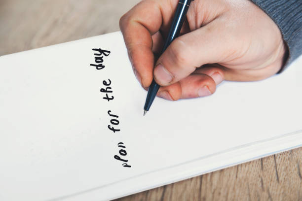 istock pencil on the open notepad with text stay at home 1224207314