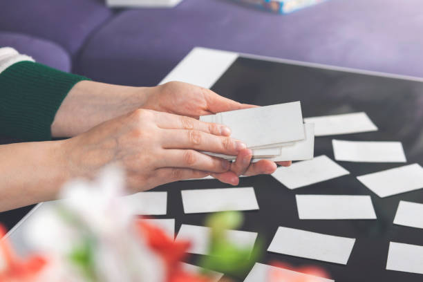 istock Card playing at home: Friends are sitting on a table 1224207350