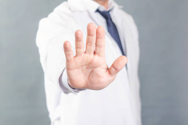 istock doctor shows his hand to stop the virus 1224207361