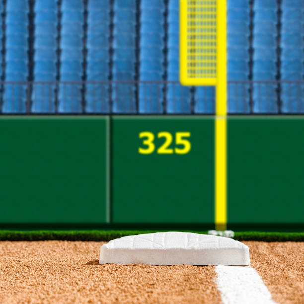 Looking down the baseline at first base with blue empty seats in the background