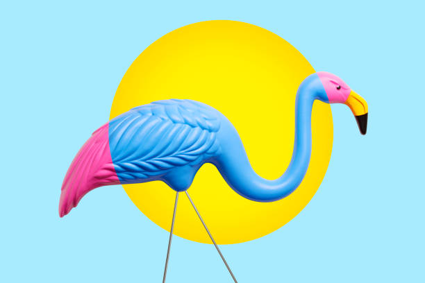 istock Multi Colored Decorative Flamingo In Front Of Sun And Blue Background 1224208192