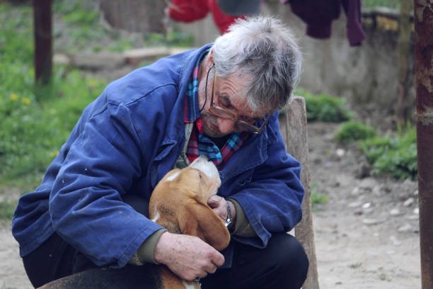 istock Mature man love dog 1224208539