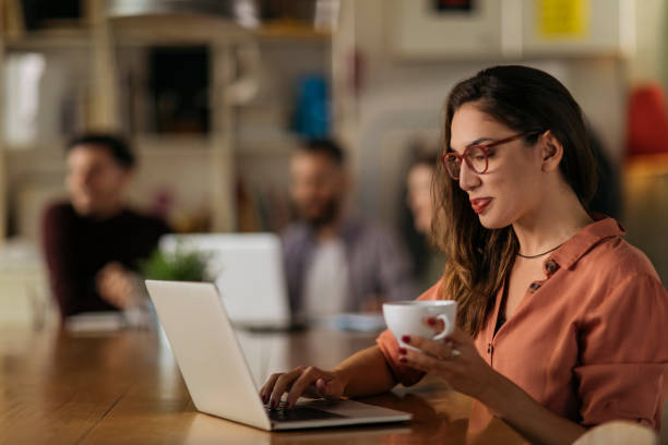 istock Portrait of a beautiful brunette in a co-working office 1224208763