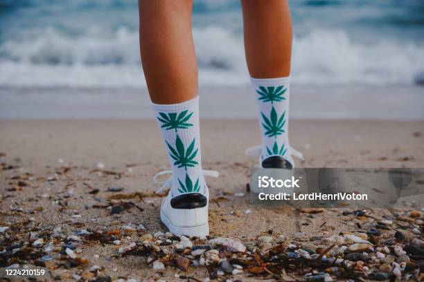Woman On Beach With Marijuana Socks Stock Photo - Download Image Now - Cannabis Plant, Legalization, Marijuana - Herbal Cannabis