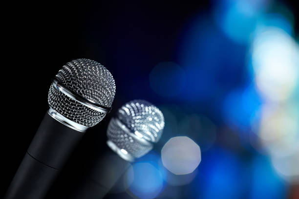 istock Closeup of two modern microphones 1224211738