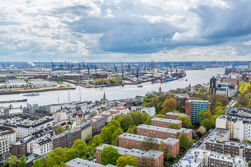 Aerial view of downtown of  Hamburg with harbor and modern buildings of Hamburg, Germany, view from the clock tower of Church of St. Michael.