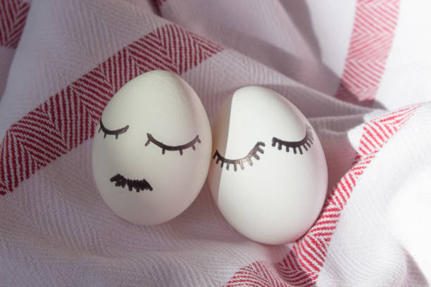 Easter eggs on a white cotton towel. Minimal easter concept. Happy Easter card. Top view.