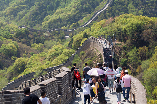 The Great Wall of China - April 28, 2018: Tourists visiting the Great Wall of China.