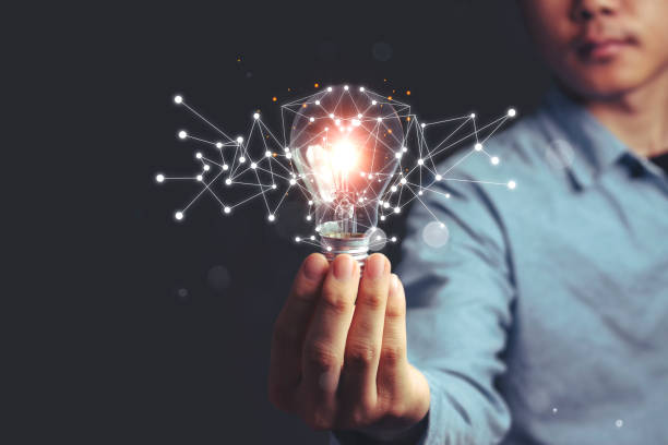 istock Asian Men holding light bulbs, ideas of new ideas with innovative technology and creativity. 1224217389
