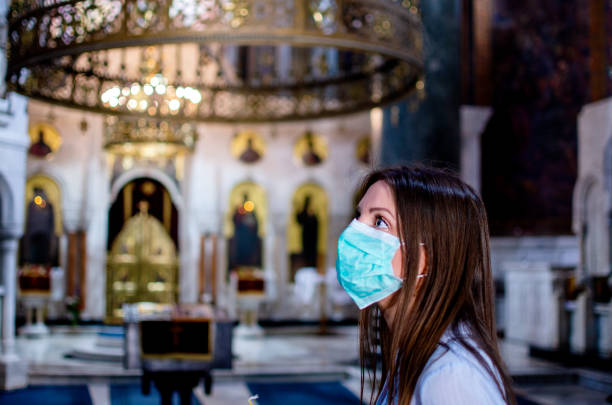 istock She visit the Church in Coronavirus time 1224221564