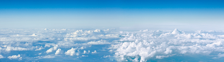 Clouds top view of the airplane. Heavenly landscape