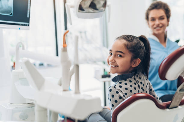 istock Smiling child in the dentist's office 1224222072