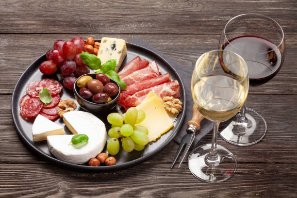 istock Cheese, meat, grapes and olives antipasto 1224222512