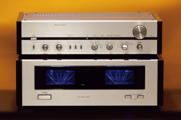 Vintage Stereo Amplifiers Stacked on each other Front view