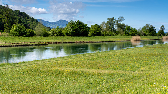 Gorgeous landscapes along the mouth of Linth river and canal at the head of the Upper Zurich Lake (Obersee), St. Gallen, Switzerland