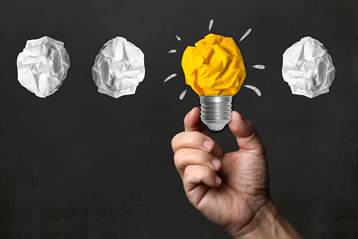 Different idea light bulb leadership success change