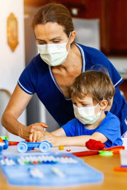istock Child boy learning with colorful clays while locked down because pandemic 1224224998