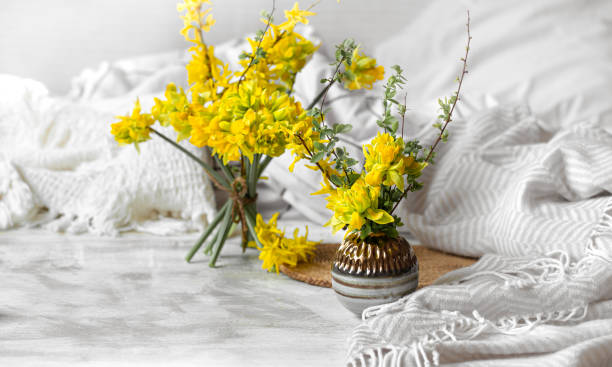 istock Spring flowers and blooms in a cozy home atmosphere. 1224226151