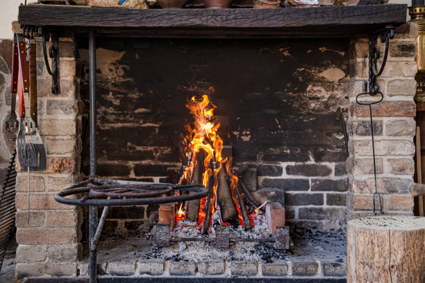 istock Fireplace with a burning fire, comfort and atmosphere. 1224226522