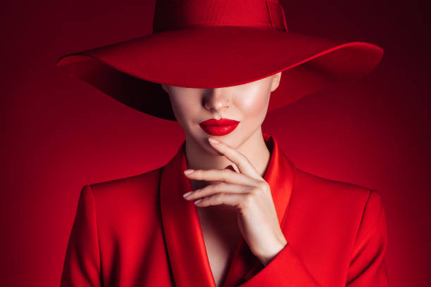 beautiful girl with make-up wearing red jacket and hat - clothing fashion model old fashioned women imagens e fotografias de stock