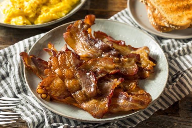 istock Homemade Salty Uncured Baked Bacon 1224240022