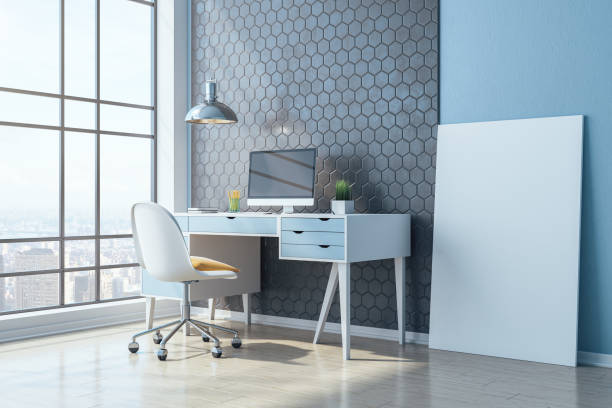 istock Modern workplace in home office with  blank poster 1224242792