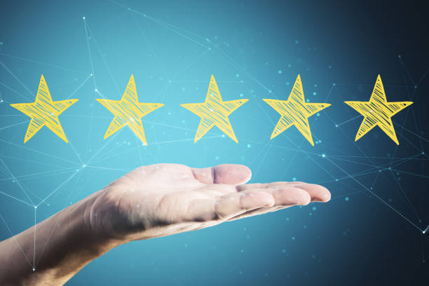 istock Hand holding yellow star rating 1224243408