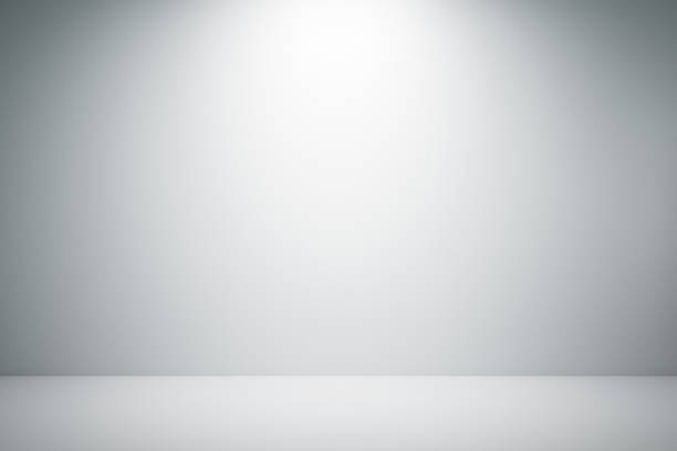 istock Front view of interior room with blank white concrete wall 1224243424