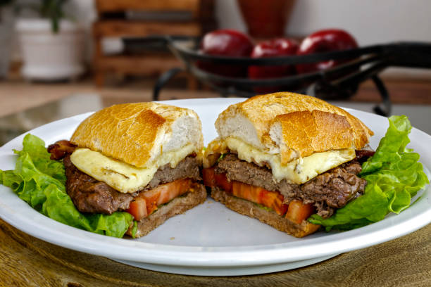 French bread sandwich with filet mignon, cheese, lettuce and tomato