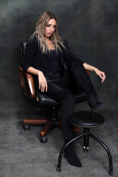 istock Beautiful, glamourous blonde girl posing in studio on isolated background. 1224244792