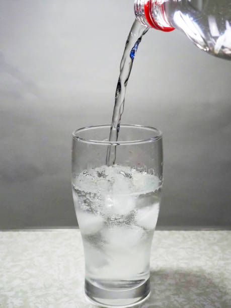 istock Water is poured into a glass 1224248459