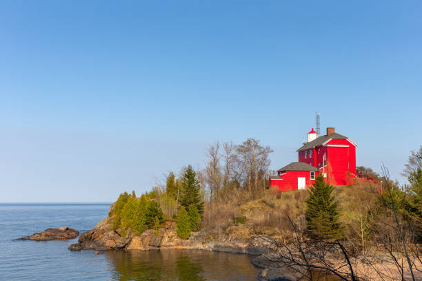 istock Red Lighthouse on Lake Superior in Upper Michigan 1224249451
