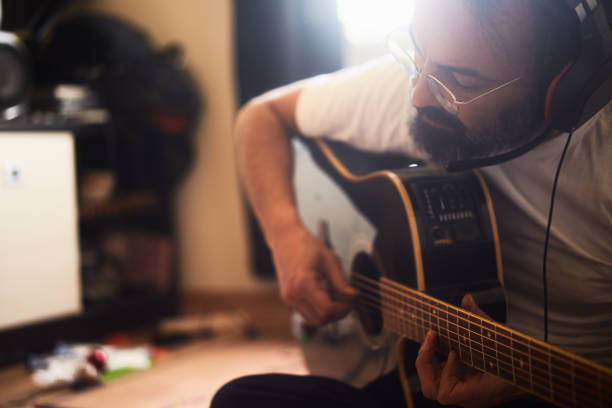 istock A man is recording music in the study room during quarantine days 1224251314