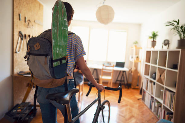 istock Young woman comes to her skateboard workshop 1224255187