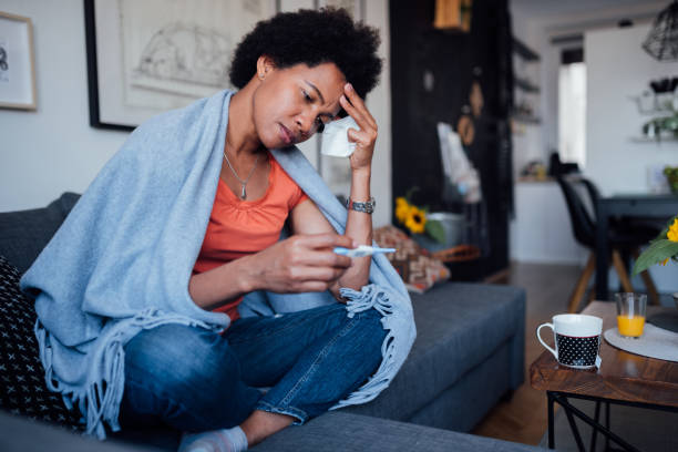 istock Adult woman being sick 1224255330