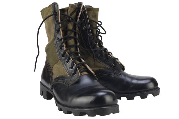 istock New brand US army pattern jungle boots isolated 1224256120