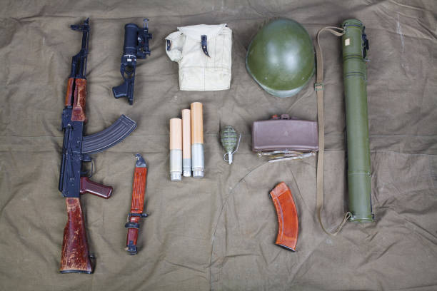 istock Kalashnikov AK 47 with ammunitions on canvas 1224256148