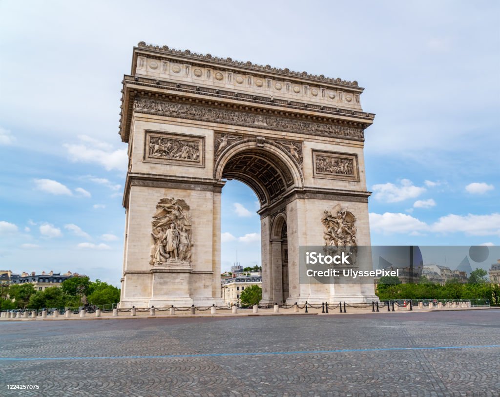 Coronavirus Lockdown in Paris Deserted Arc de Triomphe during Coronavirus Lockdown in Paris. Arc de Triomphe - Paris Stock Photo