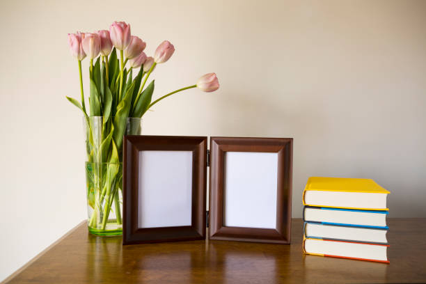 Home concept, stylish blank picture frames for loved ones or vacation photos