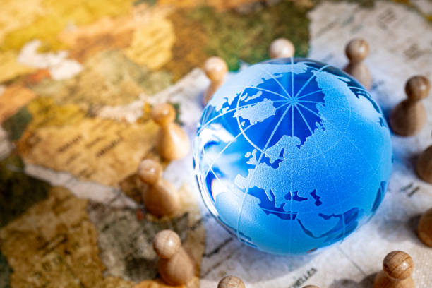 Globe and people Globe and people round the world travel stock pictures, royalty-free photos & images