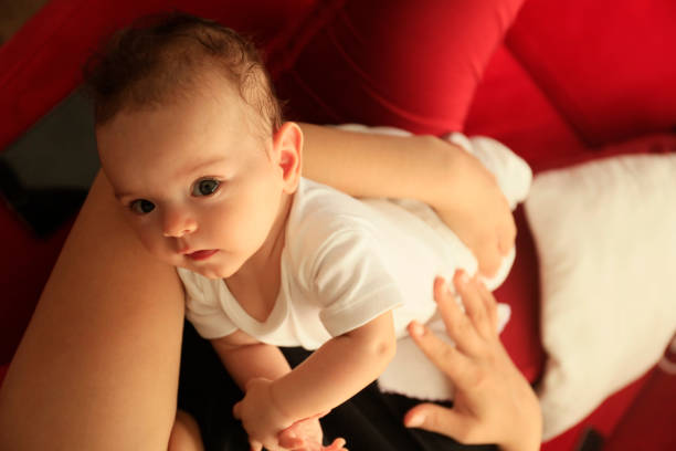 istock Baby in her mother's arms 1224263103