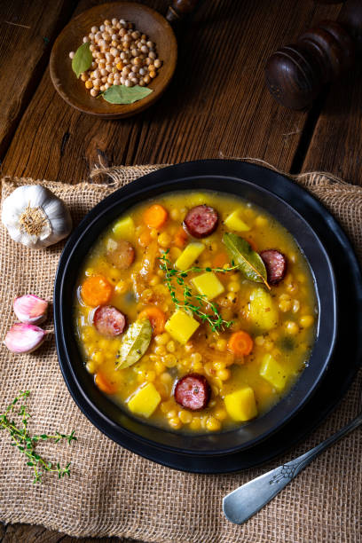 istock Rustic pea soup with bacon and sausages 1224283764