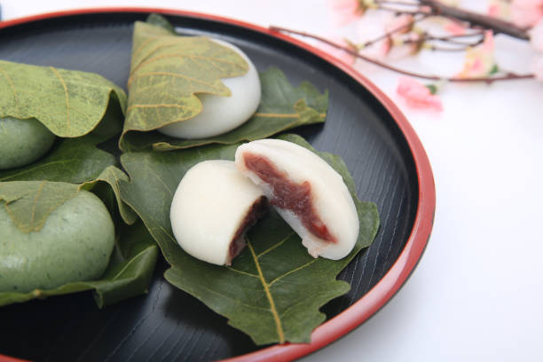 istock Rice cake containing bean jam wrapped in an oak leaf which I served in a plate 1224285471