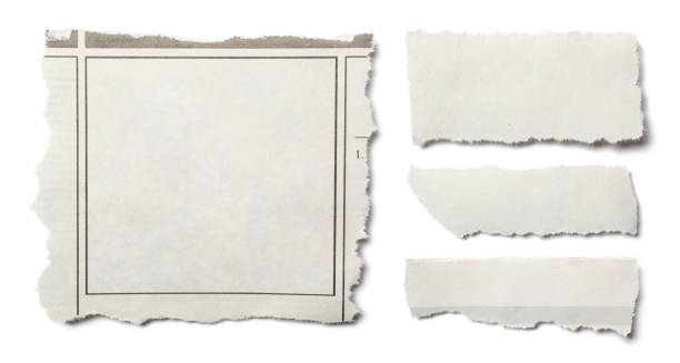 istock Front View of Assorted Torn Pieces of Newspaper on White Background 1224287636