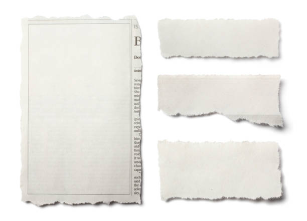 istock Front View of Assorted Torn Pieces of Newspaper on White Background 1224287640