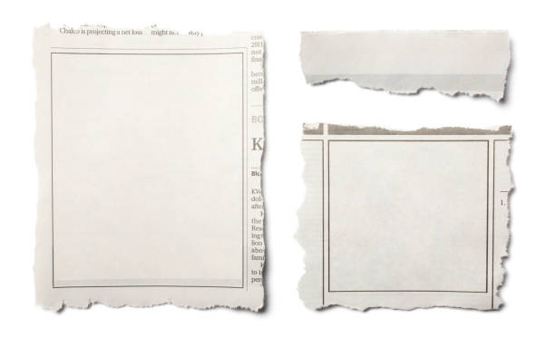 istock Front View of Assorted Torn Pieces of Newspaper on White Background 1224287645