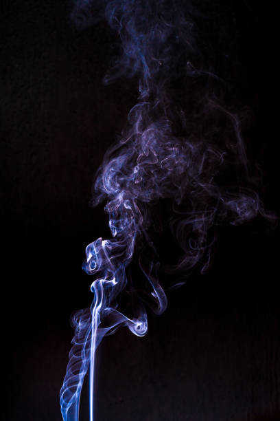 istock smoke cloud with black background. fog texture 1224293231